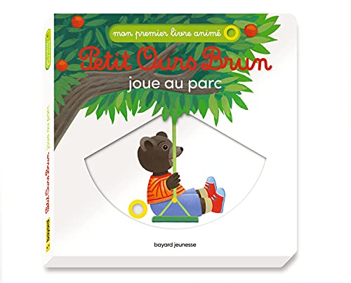 PETIT OURS BRUN JOUE AU PARC